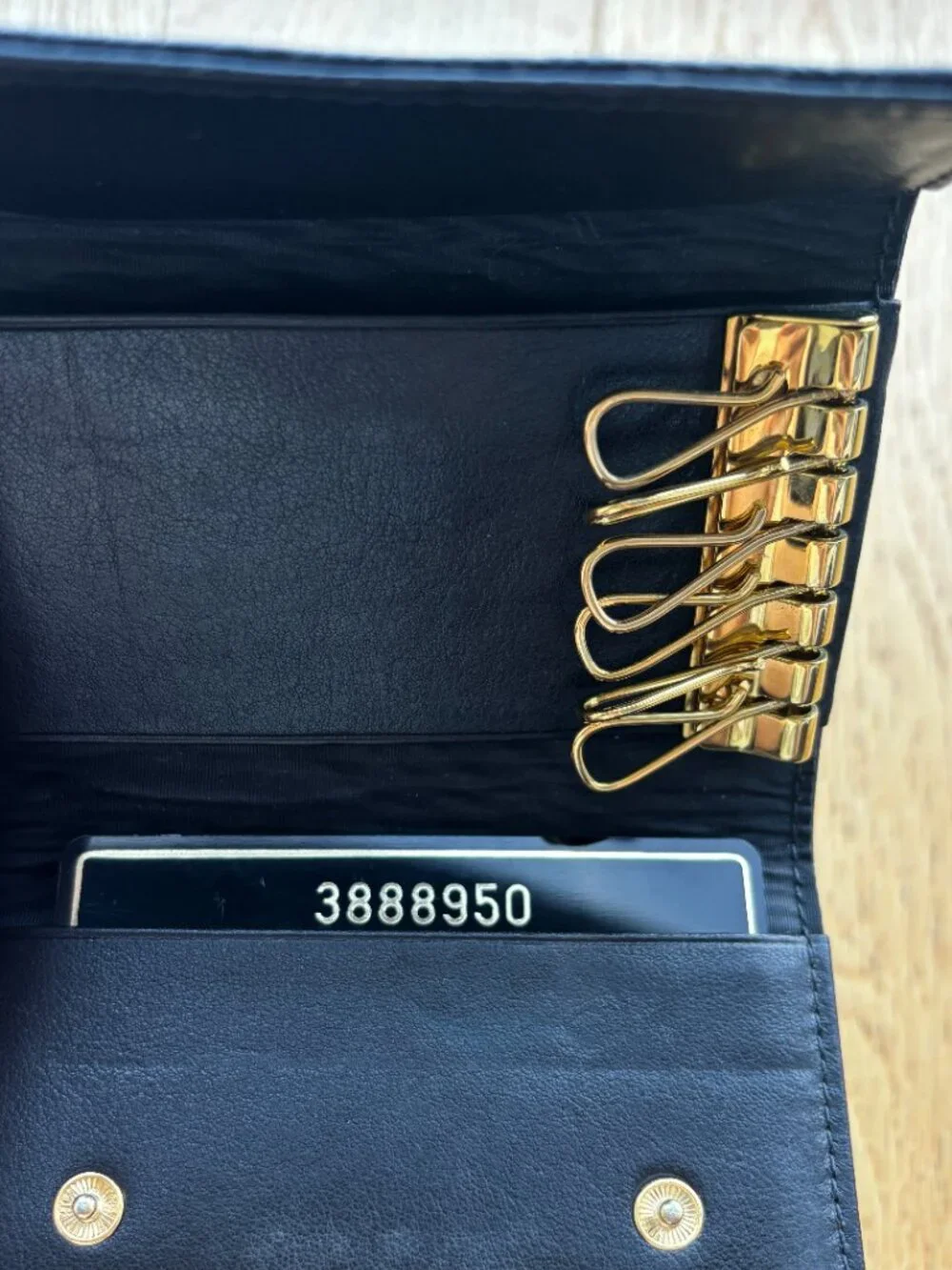 Authentic CHANEL Black Leather 6-Key Holder | Gold Hardware